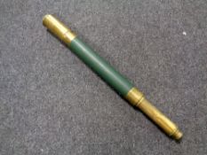 A 20th century brass and green leather nautical telescope.