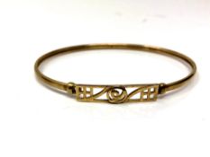 A 9ct gold bangle. CONDITION REPORT: 4.