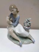 A Lladro figure : Rosalinda with flowers number 4836