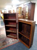 Two sets of 20th century open book shelves