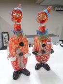 A pair of Murano glass clown decanters,