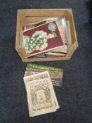 A wooden crate of a large quantity of commemorative newspapers and magazines