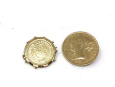 Two silver coin brooches