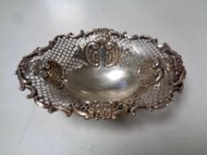 A silver pierced rimmed dish, London 1916.