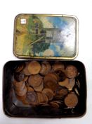 A tin of pre-decimal Victorian and George V pennies, half crowns,