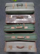 Three 20th century luggage cases and two Constellation cases