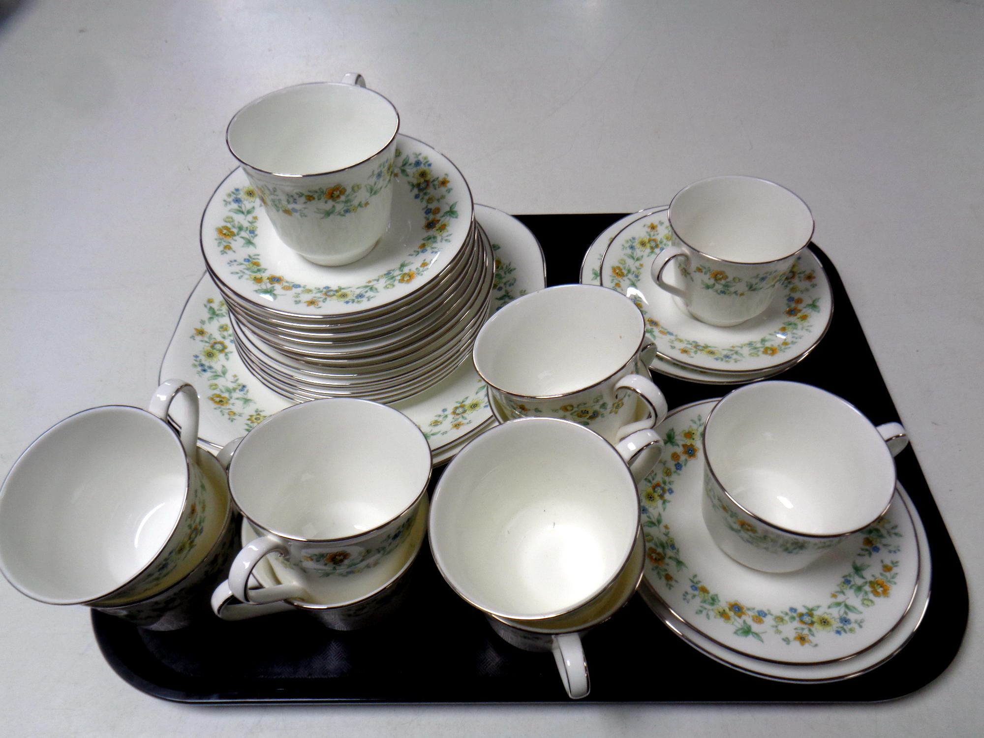 A thirty-one piece Royal Doulton Ainsdale bone china tea service