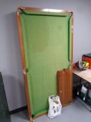 A 6ft snooker table with accessories