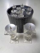 A set of six boxed Swarovski crystal miniature candlesticks together with a further pair.