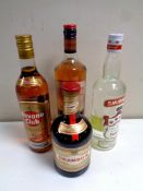 Four bottles of alcohol : The Famous Grouse Scotch whiskey, 1L, Smirnoff Vodka 75cl,