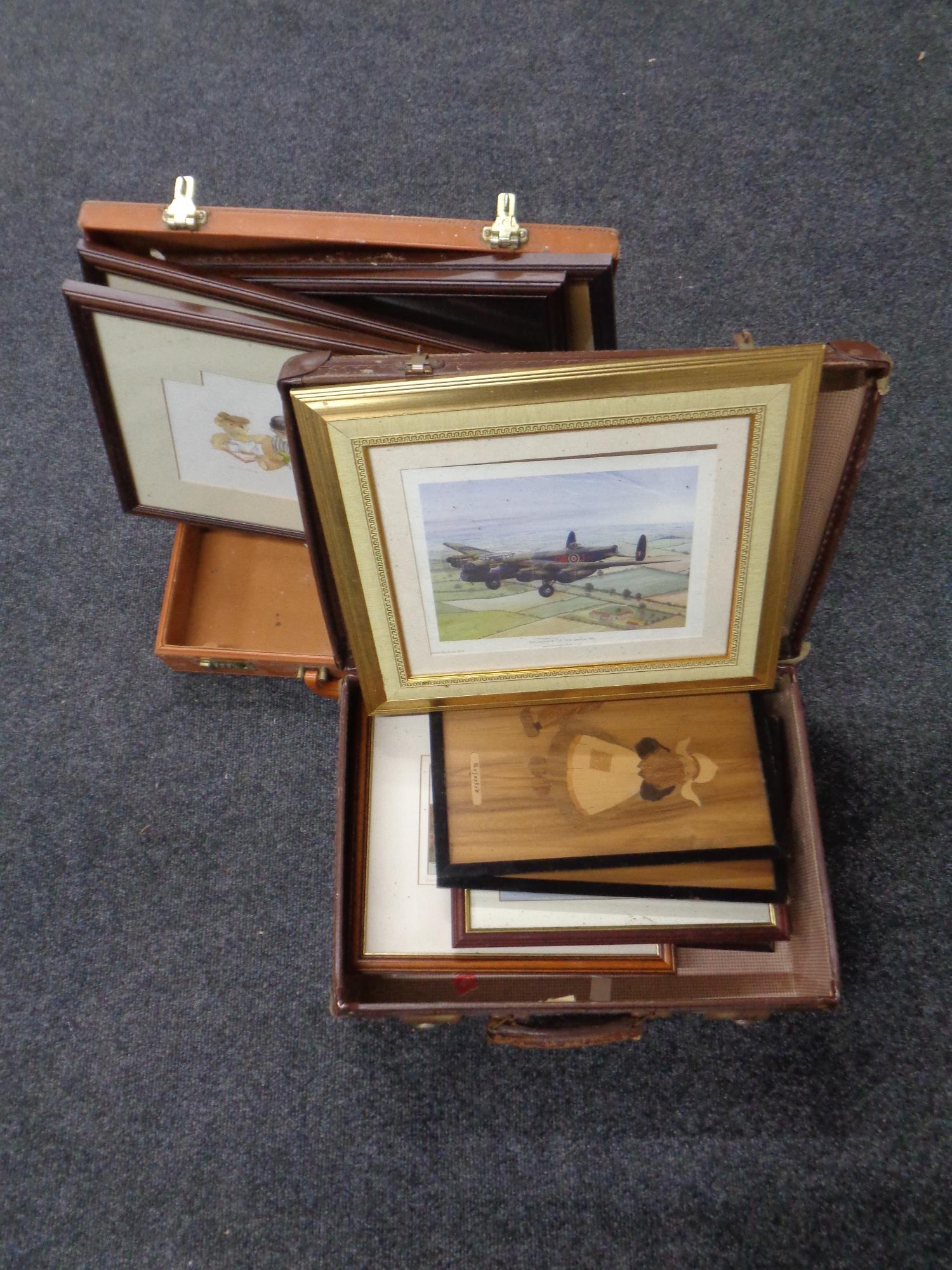 A vintage leather luggage case and a briefcase containing assorted prints, pictures,