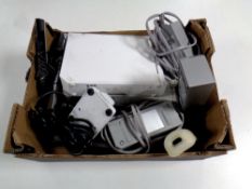 A box of two Nintendo Wii with power packs and leads,