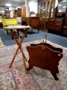 A beech brass handled magazine rack and an occasional table on bamboo legs