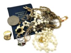 A quantity of costume jewellery, rings, pendants,