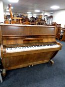 A walnut cased over strung piano by Challen