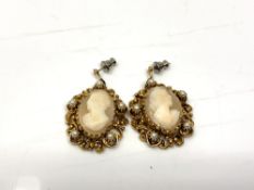 A pair of vintage cameo earrings with faux pearl decoration