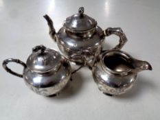 A three piece Chinese silver tea service. CONDITION REPORT: 789g.