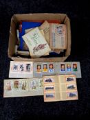 A box of large quantity of cigarette cards in albums,