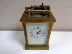 A brass cased carriage clock with key