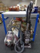 A Vax power 7 cylinder vacuum and a Shark upright vacuum with accessories