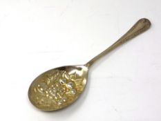 A silver plated berry spoon