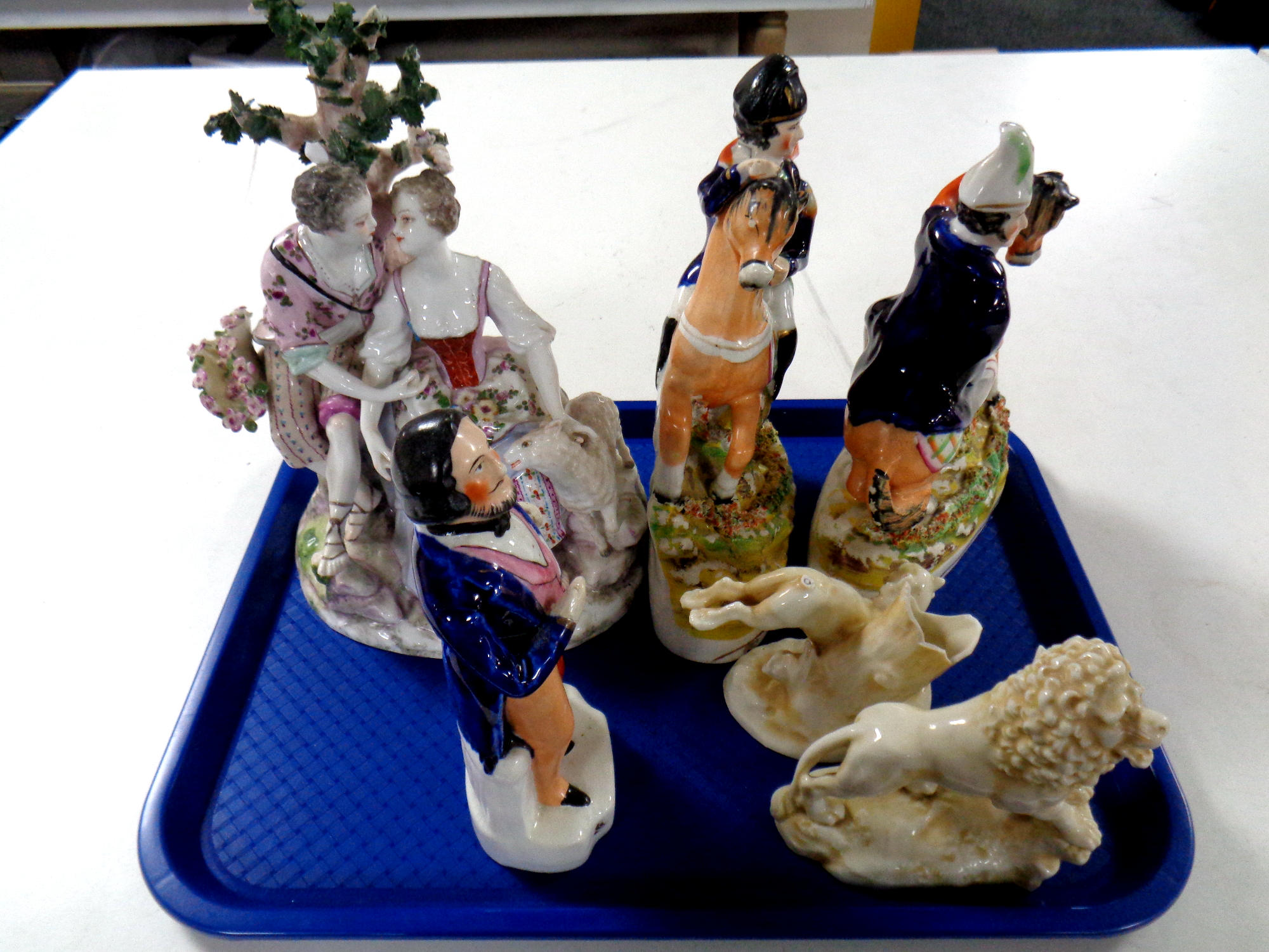 A tray of 19th century porcelain continental figure group,