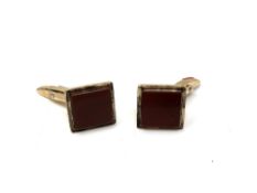 A pair of gold plated on silver cuff links