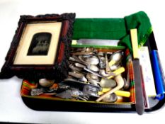 A tray of a large quantity of assorted plated and stainless steel cutlery, pocket knives,