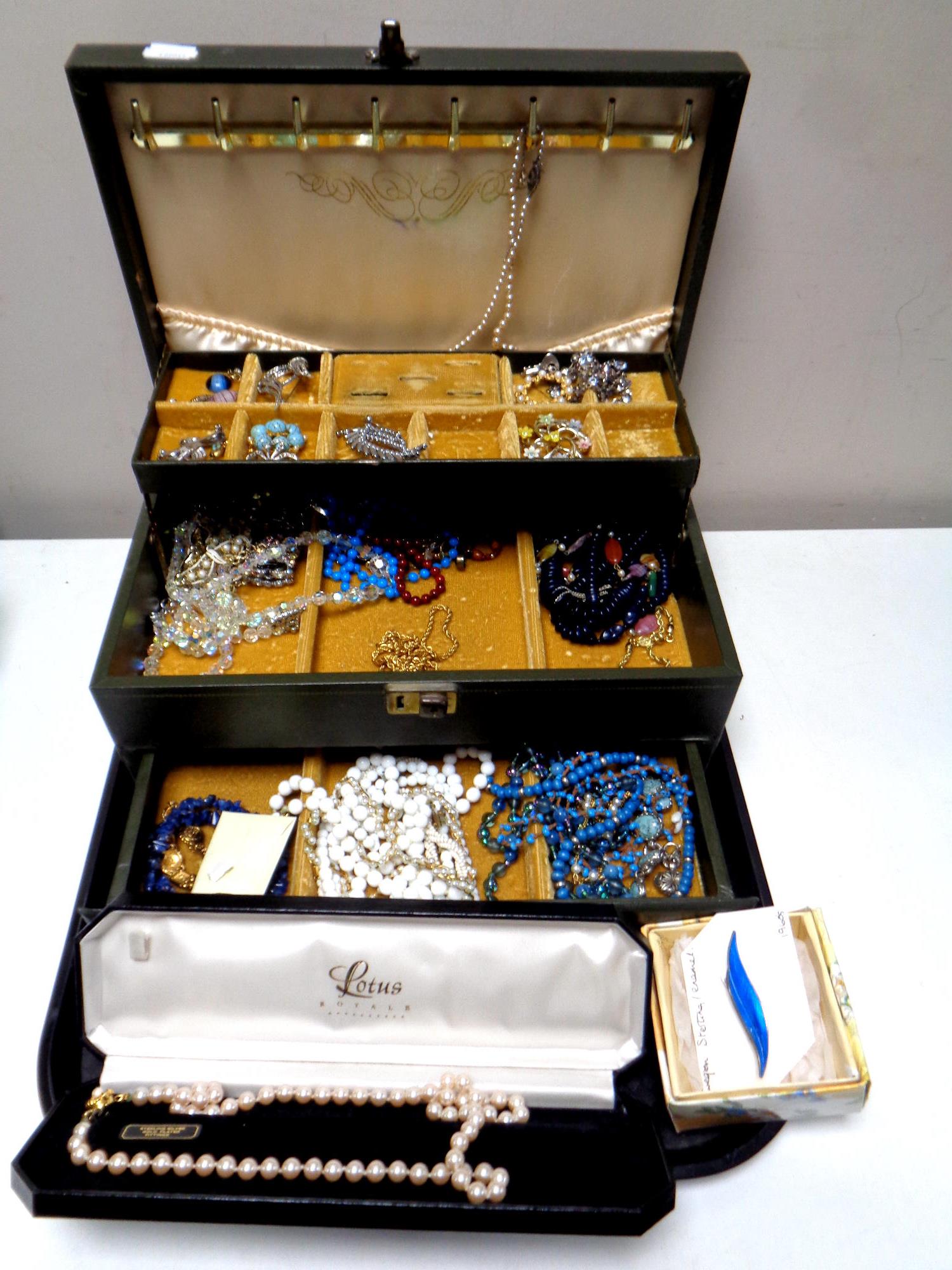 A tray of Norwegian silver and enamel leaf brooch, costume jewellery,