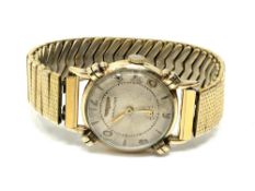 A gent's vintage gold plated wristwatch signed Hamilton, on gilt expanding strap.