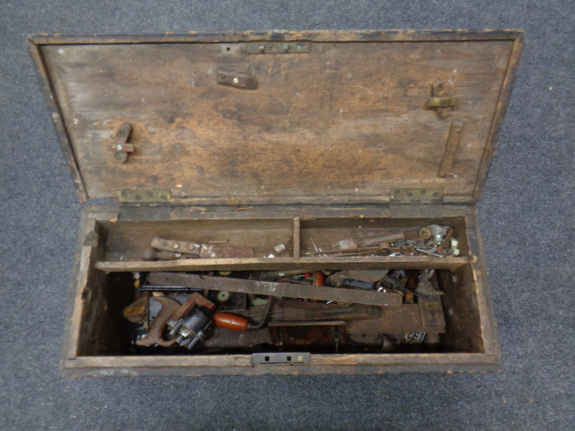 An antique pine tool chest and a quantity of hand tools : wood working planes, level brace,