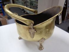 A 19th century brass swing handled coal bucket