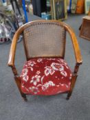 A 20th century bergere backed beech Bentwood tub chair