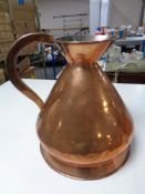 A 19th century copper two gallon jug