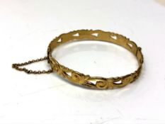 A 9ct rolled gold bracelet with pierced decoration