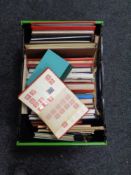 A box of approximately 40 stamp albums containing stamps of the world