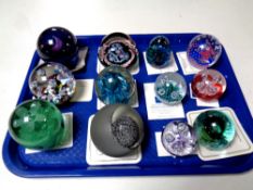 A tray of twelve Caithness paperweights