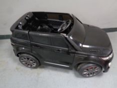 A child's electric ride on Range Rover convertible