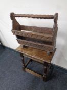 A 19th century jointed stool together with a rustic pine magazine rack