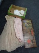 A box of two antique children's dresses,