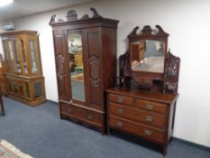 A 19th century mahogany mirror door wardrobe and a four drawer dressing chest