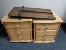 A pair of stripped pine three drawer bedside chests and a trouser press