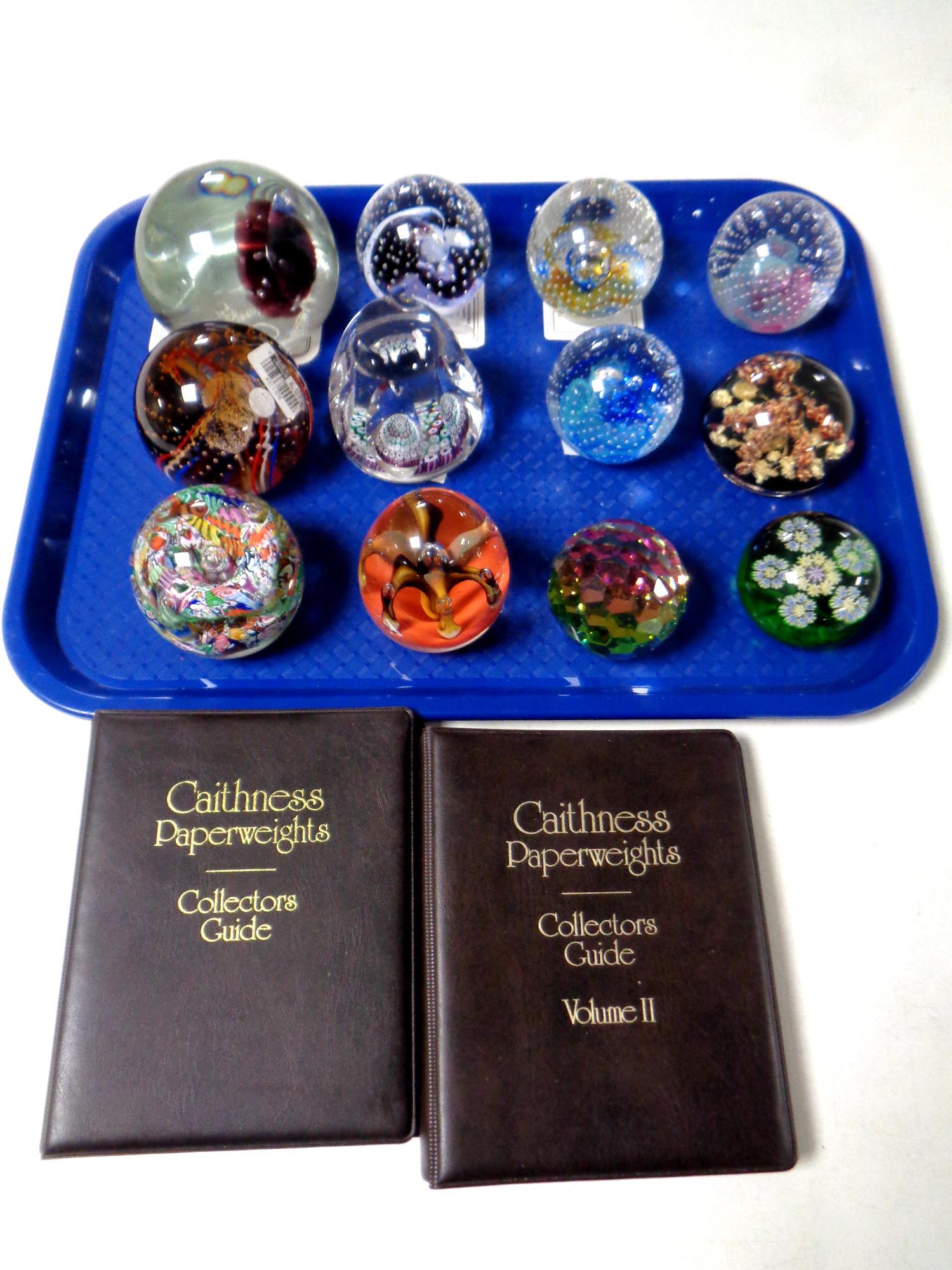 A tray of twelve assorted Caithness and crystal paperweights and two Caithness paperweights
