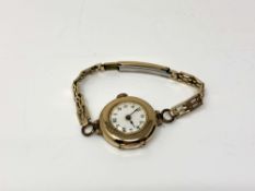 An early 20th century 9ct gold wristwatch, 17.