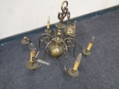 A brass six branch chandelier