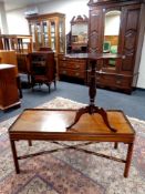 A mahogany coffee table and a pedestal wine table