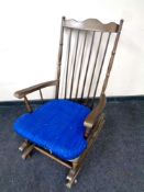 A beech spindle back rocking chair