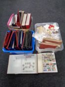 A box of two stamp albums and a large quantity of loose stamps of the world,