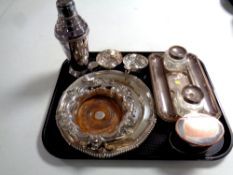 A tray of antique and later plated wares to include wine tasting cups, cocktail shaker, desk stand,