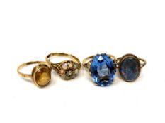 An 18ct gold opal cluster ring, together with three 9ct gold dress rings.